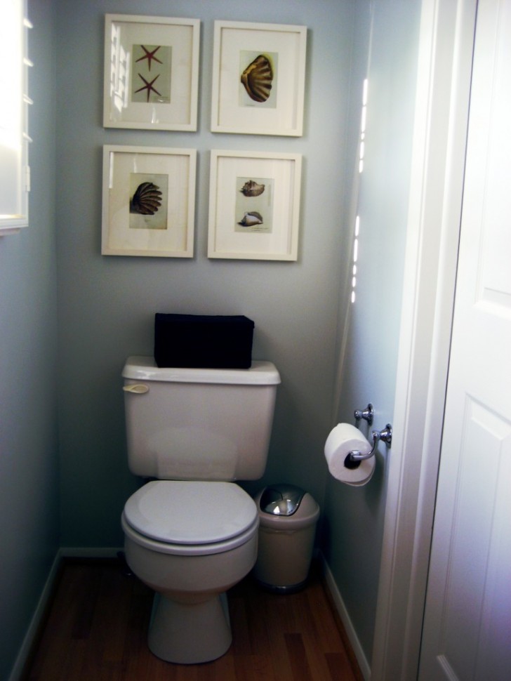 awesome-small-bathroom-decor-idea-with-wall-mounted-white-toilet-and-wall-mounted-toilet-roll-holder-and-also-burly-wood-chrome-plastic-waste-container-plus-wall-mounted-wooden-white-square-four-